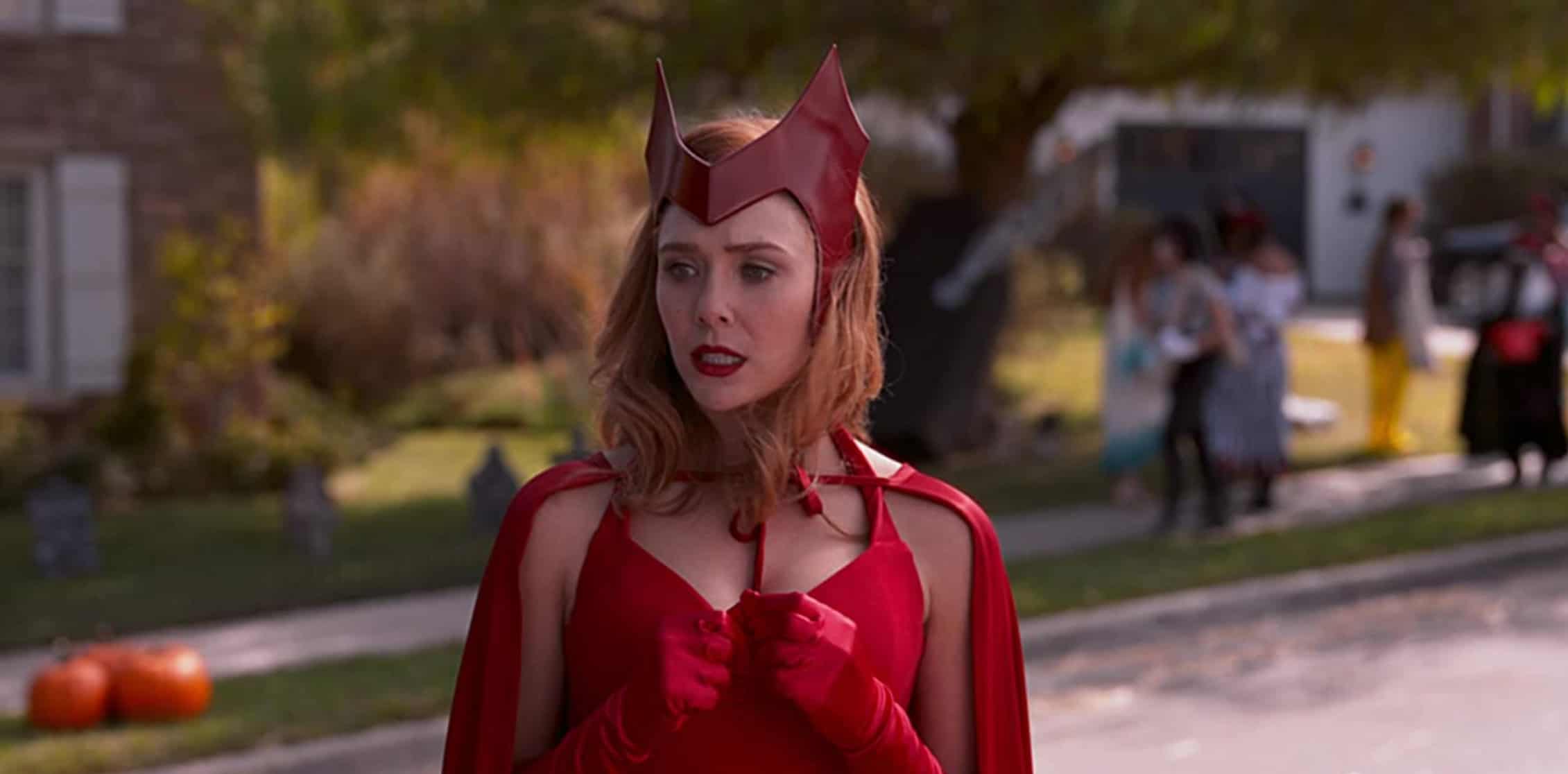 A witch in a red costume in this image from Disney Plus